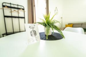 Postel nebo postele na pokoji v ubytování Valguarnera Studio Apartments