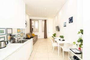 TV a/nebo společenská místnost v ubytování Valguarnera Studio Apartments