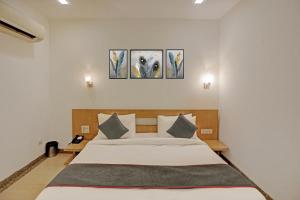 Postel nebo postele na pokoji v ubytování Super Townhouse RELAX SUITS A BOUTIQUE HOTEL VASUNDHARA