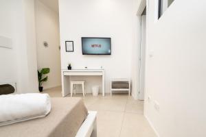 TV a/nebo společenská místnost v ubytování Valguarnera Studio Apartments