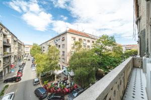 a group of people walking down a city street at Casa Linda Zagreb - FREE PARKING in Zagreb