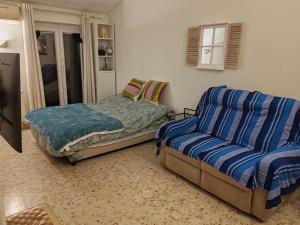 Posezení v ubytování Flat on Roman Rooftop