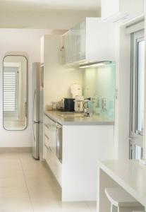 Η κουζίνα ή μικρή κουζίνα στο Resort Style Apartment