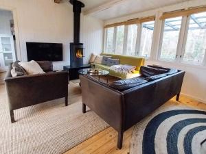 Posezení v ubytování 6 person holiday home in Jægerspris-By Traum
