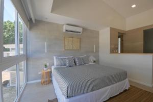 Ένα ή περισσότερα κρεβάτια σε δωμάτιο στο Villa Calula +51 φωτογραφίες