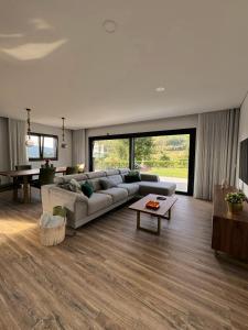 Ένα ή περισσότερα κρεβάτια σε δωμάτιο στο Whitescape Casa de Férias