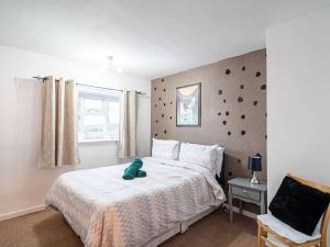 Ένα ή περισσότερα κρεβάτια σε δωμάτιο στο Agape apartment