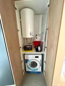 Η κουζίνα ή μικρή κουζίνα στο "Complejo Punto Tilo" apartamento Luna