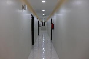 Fotografija v galeriji nastanitve فندق كنوز العنود مكة للغرف والشقق المفروشة توصيل مجاني للحرم - Knoz Al Anood Hotel Makkah For Furnished Rooms and Apartments Free Shuttle Service v Meki