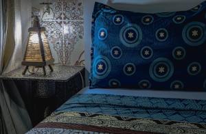Postel nebo postele na pokoji v ubytování Riad MSholidays jacuzzi privatisé Marrakech