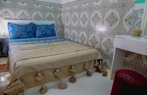 Postel nebo postele na pokoji v ubytování Riad MSholidays jacuzzi privatisé Marrakech