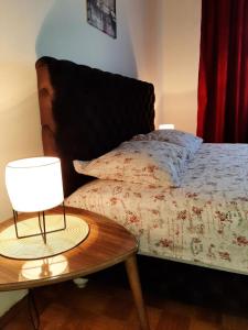 Postel nebo postele na pokoji v ubytování Apartman Trijumf