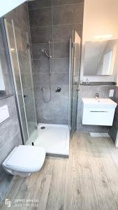 Koupelna v ubytování FMI28 Deluxe Studio-Apartments