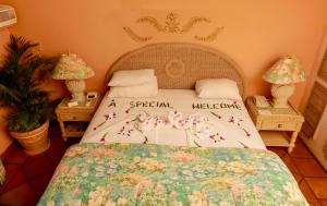 Katil atau katil-katil dalam bilik di Coco Reef Resort & Spa