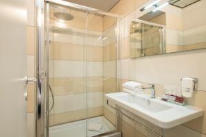 Koupelna v ubytování Arenula Suites