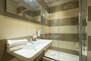 Koupelna v ubytování Arenula Suites