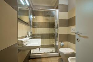 Koupelna v ubytování Arenula Suites