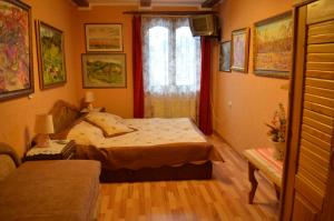 Postel nebo postele na pokoji v ubytování Villa Arefyevykh