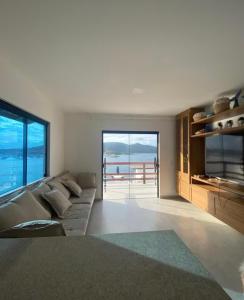 Galería fotográfica de Casa a beira-mar en Arraial do Cabo