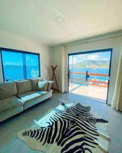 Galería fotográfica de Casa a beira-mar en Arraial do Cabo