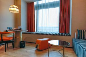 Et sittehjørne på Arthur Hotel Liwan COCO Park Dongsha Metro Guangzhou-24H Coffee & Low Tea & Free Shuttle Bus For Canton Fair By Paco