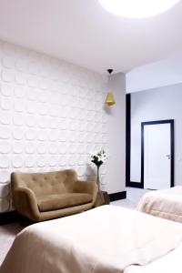 Łóżko lub łóżka w pokoju w obiekcie Hotel Nihil Novi