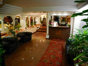 The lobby or reception area at Hotel Roma