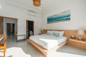 a bedroom with a large white bed in a room at Pakbia Pool Villa Aonang Krabi in Ao Nang Beach +27 photos
