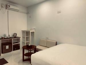 Katil atau katil-katil dalam bilik di YAMA HOTEL & ROOFTOP BAR