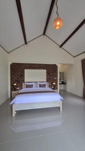 Postel nebo postele na pokoji v ubytování Rice Field inn - Lombok