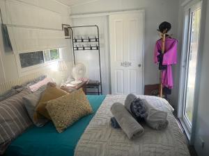 Letto o letti in una camera di TINY HOME - Benny’s Bar