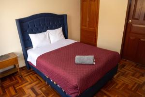 Postel nebo postele na pokoji v ubytování Conquistador Hotel