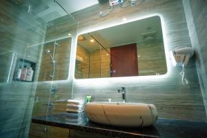 Koupelna v ubytování J60 Suites + 36 fotografií