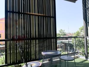 ระเบียงหรือลานระเบียงของ Amphawa Nanon Hotel