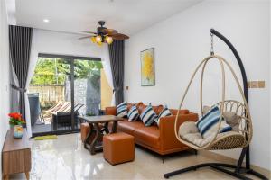 Posezení v ubytování Hai Hội Villa Hoi An