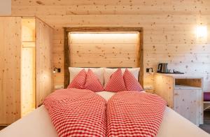Postel nebo postele na pokoji v ubytování Hotel Appartement Haus Gitschberg