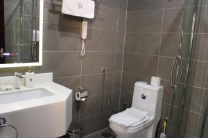 Vannituba majutusasutuses Remaj Hotel