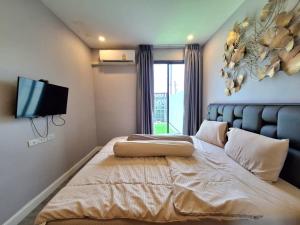 Postel nebo postele na pokoji v ubytování The Modern Hua-Hin Private Poolvilla from beach 3km + 48 fotografií