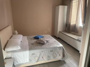 Postel nebo postele na pokoji v ubytování Meri Rooms + 3 fotografie