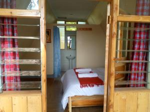 Postel nebo postele na pokoji v ubytování Riverine Cabins