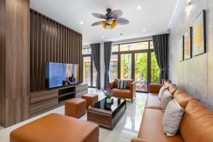 TV a/nebo společenská místnost v ubytování Hai Hội Villa Hoi An