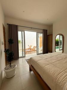 Postel nebo postele na pokoji v ubytování Bandeja Villa, your charming place in Nyan Nyang + 10 fotografií