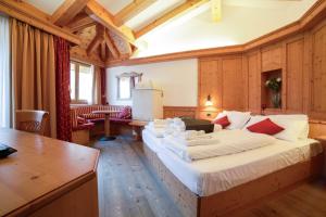 Postel nebo postele na pokoji v ubytování Nivis Hotel + 37 fotografií