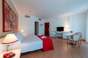 Postel nebo postele na pokoji v ubytování Hotel Torre Normanna