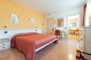 Voodi või voodid majutusasutuse Albergo Corte di Emma toas