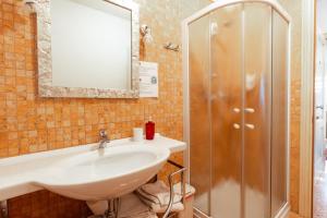 Vannituba majutusasutuses Albergo Corte di Emma