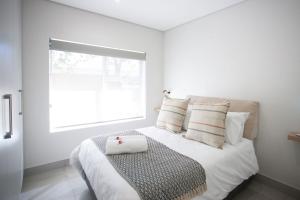 Ένα ή περισσότερα κρεβάτια σε δωμάτιο στο Townhouse 87 - 1 On York +9 φωτογραφίες