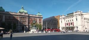 a city square with buildings and people walking around at 15 PERCENT OFF UNTIL 31st OF AUGUST ABC Luxury Space with 7 suites for 15 Guests - One Suite with Hot Tub and Sauna, Paid Parking on-site, Mandatory Reservation in Belgrade