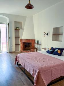 Postel nebo postele na pokoji v ubytování Trilli EcoBnB