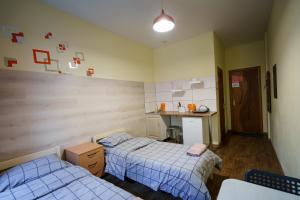 Posteľ alebo postele v izbe v ubytovaní Doba In Ua Studio Irpin Apartments